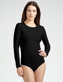 This seamless bodysuit fits like a second skin, in a soft, cotton-rich knit that's so comfortable when traveling. Crewneck Long sleeves Back thong coverage Cotton/nylon/elastene; dry clean Made in Austria