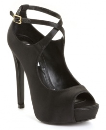 Smokin' hot and ready to trot. The Hottness pumps by Steve Madden make a classic peep-toe platform silhouette even sexier with crisscrossing straps at the ankle. Smokin' hot and ready to trot. The Hottness pumps by Steve Madden make a classic peep-toe platform silhouette even sexier with crisscrossing straps at the ankle.