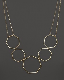 A modern statement necklace in yellow gold from Lana. A modern statement necklace in yellow gold from Lana.