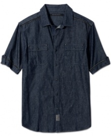 Sean John's gloss on the denim work shirt: conventional construction-complete with epaulets and flap-covered chest pockets-with a highly unconventional high-shine fabric treatment. Sean John's gloss on the denim work shirt: conventional construction-complete with epaulets and flap-covered chest pockets-with a highly unconventional high-shine fabric treatment.