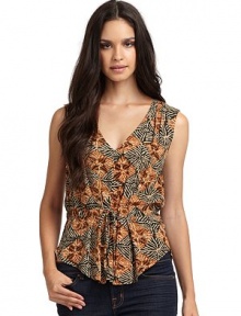 THE LOOKAllover tribal printDrawstring tie at waistPleated detail at front hemTHE FITAbout 33 from shoulder to hemTHE MATERIALRayonCARE & ORIGINDry cleanMade in USAModel shown is 5'11 (180cm) wearing US size Small. THE LOOKAllover tribal printDrawstring tie at waistPleated detail at front hemTHE FITAbout 33 from shoulder to hemTHE MATERIALRayonCARE & ORIGINDry cleanMade in USAModel shown is 5'11 (180cm) wearing US size Small.