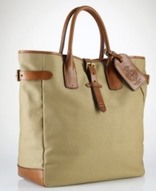 A superior carryall for daily essentials, a polished canvas bag is constructed with saddle-inspired leather trim and comfortable rolled handles and features organizational interior pocketing for quick access to the necessities. A superior carryall for daily essentials, a polished canvas bag is constructed with saddle-inspired leather trim and comfortable rolled handles and features organizational interior pocketing for quick access to the necessities.