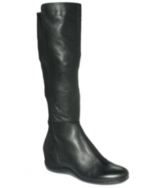 Classic and refined. DKNY Active lifts a traditional look to new heights with the Pauleena wedge boots. Classic and refined. DKNY Active lifts a traditional look to new heights with the Pauleena wedge boots.