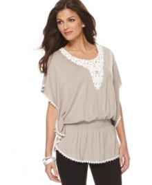 An embroidered curlicue applique and embroidered lace trim adds a feminine flair to this Alfani tunic -- a perfect spring topper! An embroidered curlicue applique and embroidered lace trim adds a feminine flair to this Alfani tunic -- a perfect spring topper!