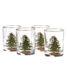 Enjoy a cocktail this holiday in these charming double old-fashioned glasses, featuring Spode's beloved Christmas Tree pattern. A full evergreen tree is impeccably decorated with baubles and tinsel, with gifts placed underneath. Set of four, each with golden rim. Each glass holds fourteen ounces of your favorite beverage. Enjoy a cocktail this holiday in these charming double old-fashioned glasses, featuring Spode's beloved Christmas Tree pattern. A full evergreen tree is impeccably decorated with baubles and tinsel, with gifts placed underneath. Set of four, each with golden rim. Each glass holds fourteen ounces of your favorite beverage.