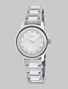 From the Orchestra Collection. Add a little sparkle with this Swarovski crystal accented timepiece. Quartz movementWater resistant to 10 ATMRound polycarbonate case, 40.5mm (1.6) Smooth stainless steel bezelSilver dialSwarovski crystal hour markersStainless steel and polycarbonate link braceletImported From the Orchestra Collection. Add a little sparkle with this Swarovski crystal accented timepiece. Quartz movementWater resistant to 10 ATMRound polycarbonate case, 40.5mm (1.6) Smooth stainless steel bezelSilver dialSwarovski crystal hour markersStainless steel and polycarbonate link braceletImported