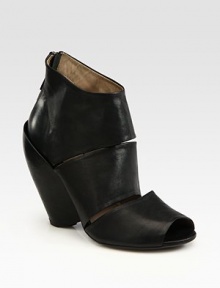 Italian leather go-to has a cutout upper, peep toe and an exposed back zipper. Self-covered wedge, 5 (125mm)Leather upperBack zipperLeather lining and solePadded insoleMade in ItalyOUR FIT MODEL RECOMMENDS ordering one half size up as this style runs small. Italian leather go-to has a cutout upper, peep toe and an exposed back zipper. Self-covered wedge, 5 (125mm)Leather upperBack zipperLeather lining and solePadded insoleMade in ItalyOUR FIT MODEL RECOMMENDS ordering one half size up as this style runs small.