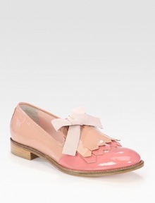 Preppy staple of glossy patent leather in contrasting tones, finished with a large bow and traditional tassel detail. Stacked heel, 1 (25mm)Patent leather upperLeather lining and solePadded insoleMade in Italy Preppy staple of glossy patent leather in contrasting tones, finished with a large bow and traditional tassel detail. Stacked heel, 1 (25mm)Patent leather upperLeather lining and solePadded insoleMade in Italy