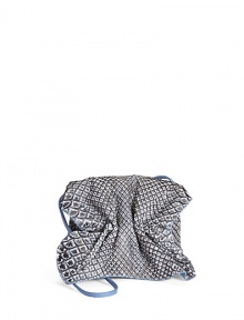 THE LOOKCrossbody strapCinched flapMagnetic tab closure under flapDrawstring topInside logo detailTHE MEASUREMENTCrossbody strap, 32 drop5W X 4H X 2½DTHE MATERIALPythonLeather and printed fabric liningORIGINMade in USA THE LOOKCrossbody strapCinched flapMagnetic tab closure under flapDrawstring topInside logo detailTHE MEASUREMENTCrossbody strap, 32 drop5W X 4H X 2½DTHE MATERIALPythonLeather and printed fabric liningORIGINMade in USA