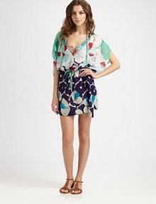 A chic coverup offering an eye-catching print, self-tie details for a great fit and a flirty mini length.Self-tie detail at v-necklineFlutter sleevesDrawstring waistBack seam58% silk/42% cottonDry cleanImported A chic coverup offering an eye-catching print, self-tie details for a great fit and a flirty mini length.Self-tie detail at v-necklineFlutter sleevesDrawstring waistBack seam58% silk/42% cottonDry cleanImported