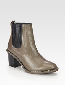 Classic leather staple with sleek zip-trim and side elastic panels for easy on and off access. Stacked heel, 2½ (65mm)Leather upper with stretch elastic panels and zipper trimPull-on styleLeather lining and solePadded insoleImported Classic leather staple with sleek zip-trim and side elastic panels for easy on and off access. Stacked heel, 2½ (65mm)Leather upper with stretch elastic panels and zipper trimPull-on styleLeather lining and solePadded insoleImported