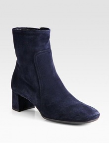 Suede block heel design with square toe and side zip. Self-covered heel, 1¾ (45mm)Suede upperSide zipperLeather liningRubber solePadded insoleImportedOUR FIT MODEL RECOMMENDS ordering one half size up as this style runs small. Suede block heel design with square toe and side zip. Self-covered heel, 1¾ (45mm)Suede upperSide zipperLeather liningRubber solePadded insoleImportedOUR FIT MODEL RECOMMENDS ordering one half size up as this style runs small.