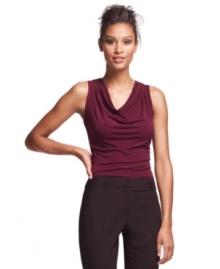 The soft draping on Calvin Klein's jersey shell makes an elegant counterpoint to sharply tailored suits and work separates alike. The soft draping on Calvin Klein's jersey shell makes an elegant counterpoint to sharply tailored suits and work separates alike.