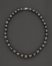 Darkly shimmering Tahitian pearls with 14K. white gold. Darkly shimmering Tahitian pearls with 14K. white gold.