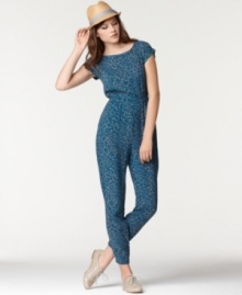 An on-trend casual look, this printed Bar III jumpsuit features a buttoned envelope-style back for an unexpected element! An on-trend casual look, this printed Bar III jumpsuit features a buttoned envelope-style back for an unexpected element!