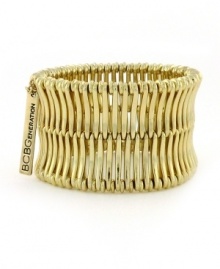 For a quick style pick-me-up, just add this dramatic BCBGeneration design to your digits. A linear-shaped band shines in rich gold tone mixed metal and displays the company logo. Ring stretches to fit finger. For a quick style pick-me-up, just add this dramatic BCBGeneration design to your digits. A linear-shaped band shines in rich gold tone mixed metal and displays the company logo. Ring stretches to fit finger.
