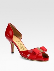 Shiny patent leather forms this low-cut pump, with a classic peep toe and logo-detailed bow. Self-covered heel, 3 (75mm)Patent leather upper with grosgrain ribbon bowPeep toeLeather lining and solePadded insoleMade in Italy Shiny patent leather forms this low-cut pump, with a classic peep toe and logo-detailed bow. Self-covered heel, 3 (75mm)Patent leather upper with grosgrain ribbon bowPeep toeLeather lining and solePadded insoleMade in Italy