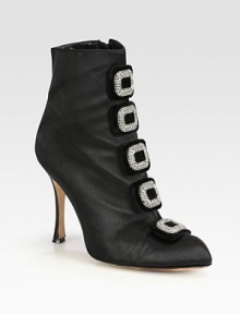 Chic ankle boot silhouette of rich satin with luminous Swarovski crystals. Self-covered heel, 4¼ (110mm)Satin upper with Swarovski crystalsSide zipLeather lining and solePadded insoleMade in Italy Chic ankle boot silhouette of rich satin with luminous Swarovski crystals. Self-covered heel, 4¼ (110mm)Satin upper with Swarovski crystalsSide zipLeather lining and solePadded insoleMade in Italy