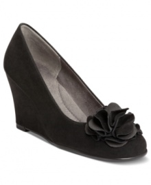 Let the tide of sophistication sweep over your feet. Aerosoles' Plumbrella wedges feature a pretty flower accent at the toe and a cushioned footbed for maximum comfort. Let the tide of sophistication sweep over your feet. Aerosoles' Plumbrella wedges feature a pretty flower accent at the toe and a cushioned footbed for maximum comfort.