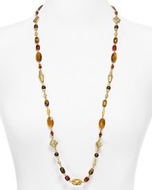 Lauren by Ralph Lauren channels exotic glamor with this beaded necklace. Crafted of 14 karat gold, its antique gold bead work and gorgeous marble-like stations have a far away feel. Lauren by Ralph Lauren channels exotic glamor with this beaded necklace. Crafted of 14 karat gold, its antique gold bead work and gorgeous marble-like stations have a far away feel.