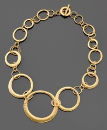 Stand out in a crowd. This gorgeous Lauren by Ralph Lauren circle necklace is crafted in goldtone mixed metal. Approximate length: 18 inches. Stand out in a crowd. This gorgeous Lauren by Ralph Lauren circle necklace is crafted in goldtone mixed metal. Approximate length: 18 inches.