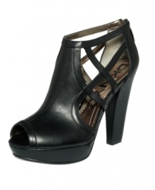 Towering with sexy side cut-outs. DKNYC's Hanna platform sandals give your outfit instant intrigue. Towering with sexy side cut-outs. DKNYC's Hanna platform sandals give your outfit instant intrigue.