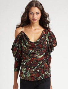THE LOOKDraped cowl neckline Side zip closureLong sleeves with asymmetrical draped shouldersEmpire waistSide ruchingRuffled hemTHE FITDraped silhouette About 27 from shoulder to hemTHE MATERIAL95% silk/5% spandexCARE & ORIGINDry clean Imported THE LOOKDraped cowl neckline Side zip closureLong sleeves with asymmetrical draped shouldersEmpire waistSide ruchingRuffled hemTHE FITDraped silhouette About 27 from shoulder to hemTHE MATERIAL95% silk/5% spandexCARE & ORIGINDry clean Imported
