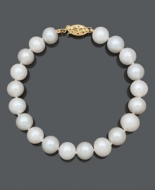 A timeless piece that makes the perfect gift. Bracelet features a simple strand of cultured freshwater pearls (9-10 mm) with a 14k gold clasp. Approximate length: 8 inches. A timeless piece that makes the perfect gift. Bracelet features a simple strand of cultured freshwater pearls (9-10 mm) with a 14k gold clasp. Approximate length: 8 inches.