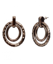 Warm colors blend perfectly with any look. Monet's bronze tone mixed metal drop hoops feature smooth and textured surfaces and a double circle design. Approximate drop: 1-1/4 inches.