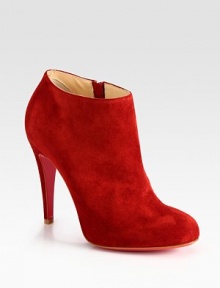 Lifted by a self-covered heel, soft suede shapes a sophisticated, side-zip ankle boot. Self-covered heel, 4 (100mm)Suede upperSide zipperLeather liningSignature red leather solePadded insoleMade in ItalyOUR FIT MODEL RECOMMENDS ordering true size. Lifted by a self-covered heel, soft suede shapes a sophisticated, side-zip ankle boot. Self-covered heel, 4 (100mm)Suede upperSide zipperLeather liningSignature red leather solePadded insoleMade in ItalyOUR FIT MODEL RECOMMENDS ordering true size.
