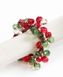 Dress up simple linens for a seasonal bash with napkin rings strung with sparkling beads. Shades of red and green complete a memorable holiday table. Dress up simple linens for a seasonal bash with napkin rings strung with sparkling beads. Shades of red and green complete a memorable holiday table.