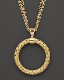 Multiple chains flank an intricately woven yellow silver pendant from Fifth Season by Roberto Coin. Multiple chains flank an intricately woven yellow silver pendant from Fifth Season by Roberto Coin.