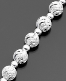 This distinctive bracelet features beautifully swirled beads (6 mm) of luminous diamond-cut sterling silver by Giani Bernini. Approximate length: 7-1/2 inches. This distinctive bracelet features beautifully swirled beads (6 mm) of luminous diamond-cut sterling silver by Giani Bernini. Approximate length: 7-1/2 inches.