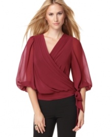 Get a fresh feminine look with this blouse from Studio M. Flowing and lightweight, it's the perfect match for everything from black pants to pencil skirts. Get a fresh feminine look with this blouse from Studio M. Flowing and lightweight, it's the perfect match for everything from black pants to pencil skirts.