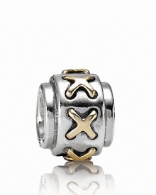A sterling silver and 14K gold PANDORA charm with a graphic laced-up pattern. A sterling silver and 14K gold PANDORA charm with a graphic laced-up pattern.