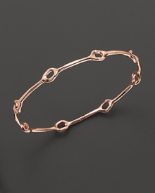 This slim bangle is punctuated by oval stations--the perfect bracelet for stacking. This slim bangle is punctuated by oval stations--the perfect bracelet for stacking.