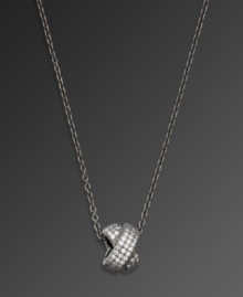 A simple twist takes your look a long way. CRISLU necklace features a traditional twist pendant covered in sparkling, round-cut cubic zirconias (1-1/8 ct. t.w.). Setting and chain crafted in hematite over sterling silver. Approximate length: 16 inches + 2-inch extender. Approximate drop: 3/8 inch. A simple twist takes your look a long way. CRISLU necklace features a traditional twist pendant covered in sparkling, round-cut cubic zirconias (1-1/8 ct. t.w.). Setting and chain crafted in hematite over sterling silver. Approximate length: 16 inches + 2-inch extender. Approximate drop: 3/8 inch.