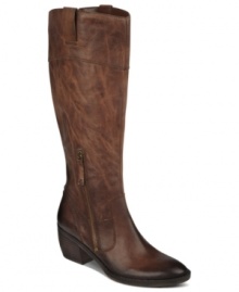 Ride high in the saddle with these sky-high boots from Naturalizer. The Ora features a wide-calf, pull-on silhouette. Ride high in the saddle with these sky-high boots from Naturalizer. The Ora features a wide-calf, pull-on silhouette.