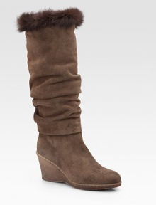 Slightly slouched, weatherproof suede style topped off with a plush rabbit fur trim. Crepe wedge, 3 (75mm) Shaft, 14½ Leg circumference, 15 Rabbit fur cuff Weatherproof suede upper Faux fur lining Rubber sole Padded insole ImportedOUR FIT MODEL RECOMMENDS ordering one half size up as this style runs small. Slightly slouched, weatherproof suede style topped off with a plush rabbit fur trim. Crepe wedge, 3 (75mm) Shaft, 14½ Leg circumference, 15 Rabbit fur cuff Weatherproof suede upper Faux fur lining Rubber sole Padded insole ImportedOUR FIT MODEL RECOMMENDS ordering one half size up as this style runs small.