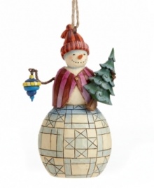 A jolly, happy soul, this snowman features a carrot nose and two eyes that look like coal. With his very own tree and ice-blue ornament. From the Heartwood Creek collection by Jim Shore. A jolly, happy soul, this snowman features a carrot nose and two eyes that look like coal. With his very own tree and ice-blue ornament. From the Heartwood Creek collection by Jim Shore.