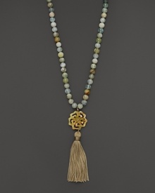 A carved pendant finished with bold tassel lends exotic flair to this beaded aquamarine necklace from Lara Gold for LTC. A carved pendant finished with bold tassel lends exotic flair to this beaded aquamarine necklace from Lara Gold for LTC.