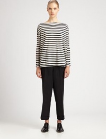 This decidedly nautical-inspired piece is cut with a boxy, oversized silhouette and banded with sporty stripes.BoatneckDropped shoulderLong sleevesLonger back hemWoolDry cleanImportedModel shown is 5'9½ (176cm) wearing US size Small. This decidedly nautical-inspired piece is cut with a boxy, oversized silhouette and banded with sporty stripes.BoatneckDropped shoulderLong sleevesLonger back hemWoolDry cleanImportedModel shown is 5'9½ (176cm) wearing US size Small.
