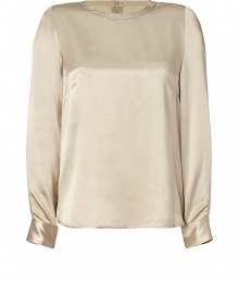 Sophisticated and sexy top in fine champagne-colored silk - Narrow, straight cut creates a sleek look - Features a rounded neck, long sleeves and rounded hem - Decorative full placket at back - Style with skinny jeans, pencil skirt or leather pants Sophisticated and sexy top in fine champagne-colored silk - Narrow, straight cut creates a sleek look - Features a rounded neck, long sleeves and rounded hem - Decorative full placket at back - Style with skinny jeans, pencil skirt or leather pants
