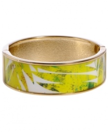 Channel the exoticism and energy of Brasil in Haskell's inspired skinny bangle. The Palm bangle features a yellow and green palm leaf print design, set in gold tone mixed metal with a hinge clasp. Approximate diameter: 2-1/2 inches. Approximate length: 8 inches. Item comes packaged in a green gift box. Channel the exoticism and energy of Brasil in Haskell's inspired skinny bangle. The Palm bangle features a yellow and green palm leaf print design, set in gold tone mixed metal with a hinge clasp. Approximate diameter: 2-1/2 inches. Approximate length: 8 inches. Item comes packaged in a green gift box.