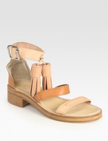 Oversized tassels and modern colorblocking rejuvenate this leather gladiator with a wide, adjustable ankle strap. Stacked heel, 1 (25mm)Leather upperLeather lining and solePadded insoleMade in ItalyOUR FIT MODEL RECOMMENDS ordering true whole size; ½ sizes should order the next whole size down. Oversized tassels and modern colorblocking rejuvenate this leather gladiator with a wide, adjustable ankle strap. Stacked heel, 1 (25mm)Leather upperLeather lining and solePadded insoleMade in ItalyOUR FIT MODEL RECOMMENDS ordering true whole size; ½ sizes should order the next whole size down.