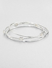 From the Rock Candy® Collection. A trio of hammered, sterling silver bangles accented with faceted mother-of-pearl. Sterling silverMother-of-pearlDiameter, about 2.5Slip-on styleImported From the Rock Candy® Collection. A trio of hammered, sterling silver bangles accented with faceted mother-of-pearl. Sterling silverMother-of-pearlDiameter, about 2.5Slip-on styleImported