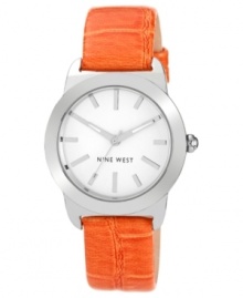 A splash of orange livens up this chic watch from Nine West. A splash of orange livens up this chic watch from Nine West.