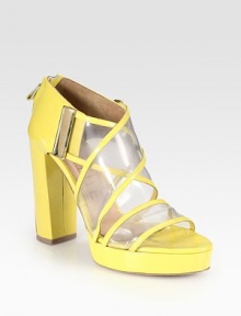 Vibrant patent leather trim radiates from translucent straps, concluding with a stacked heel and convenient back zipper. Stacked heel, 4 (100mm)Stacked platform, ½ (15mm)Compares to a 3½ heel (90mm)Leather upperBack zipperLeather lining and solePadded insoleMade in Italy Vibrant patent leather trim radiates from translucent straps, concluding with a stacked heel and convenient back zipper. Stacked heel, 4 (100mm)Stacked platform, ½ (15mm)Compares to a 3½ heel (90mm)Leather upperBack zipperLeather lining and solePadded insoleMade in Italy