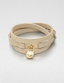 This effortless style features a chic logo accented padlock charm on a supple wrapped leather strip. LeatherGoldtone brassLength, about 25Buckle closureImported This effortless style features a chic logo accented padlock charm on a supple wrapped leather strip. LeatherGoldtone brassLength, about 25Buckle closureImported