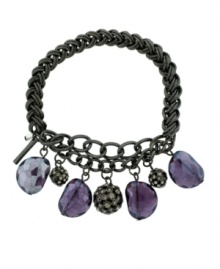 Eye-catching and eclectic. Chic cylindrical charms and faceted glass accents in a rich purple hue add distinctive detailing to Kenneth Cole New York's stretch bracelet. Crafted in mixed metal, the stretch design lets it slip on and off with ease. Includes a signature gift box. Approximate length: 7-1/2 inches. Eye-catching and eclectic. Chic cylindrical charms and faceted glass accents in a rich purple hue add distinctive detailing to Kenneth Cole New York's stretch bracelet. Crafted in mixed metal, the stretch design lets it slip on and off with ease. Includes a signature gift box. Approximate length: 7-1/2 inches.